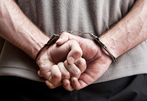 bigstock Criminal In Handcuffs 14611325 300x206 - Former New York Jets Player Sentenced under New Jersey’s Anti-Revenge Porn Law