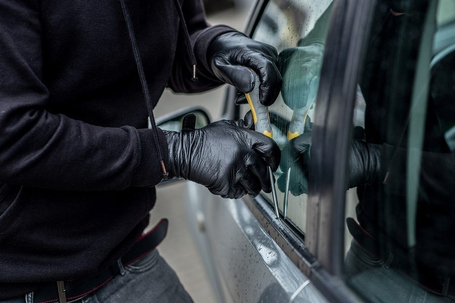 bigstock Car Thief Trying To Break Into 129418844 - Atlantic County Carjacking Defense Attorney