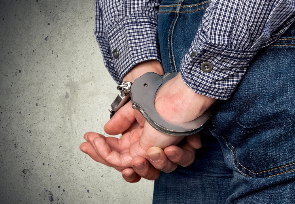 bigstock Busted handcuffs 102595910 1024x708 - Charged with Leaving the Scene of an Accident Resulting in Death (N.J.S.A. 2C:11-5.1) in Atlantic City