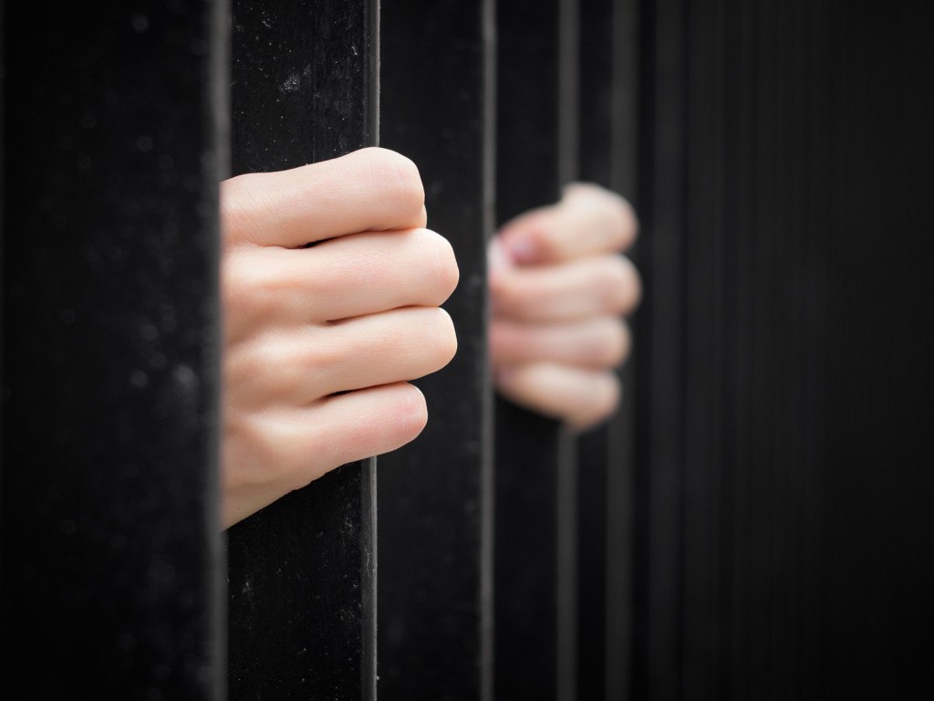bigstock Prisoner behind jail bars 73500814 1024x768 - What are the Most Common Violent criminal charges in New Jersey?